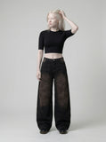 DAXUEN Distressed wide-leg denim pants — model photo
