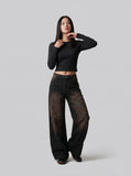 DAXUEN Distressed wide-leg denim pants — model photo