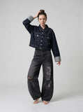 DAXUEN Distressed wide-leg denim pants with unique pockets and embroidery — model photo