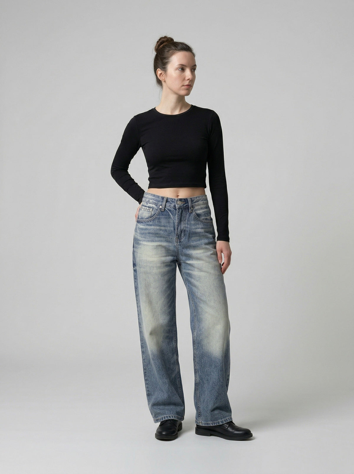 DAXUEN Distressed high-waisted wide-leg jeans in medium blue denim — model photo