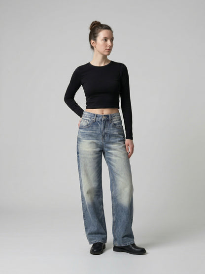 DAXUEN Distressed high-waisted wide-leg jeans in medium blue denim — model photo