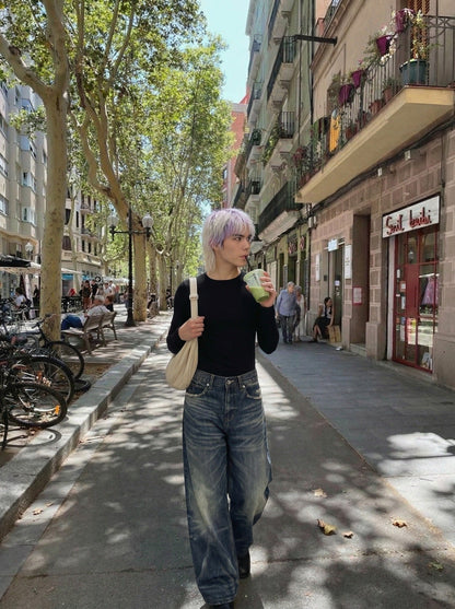 DAXUEN Distressed wide-leg jeans in dark blue wash — model photo