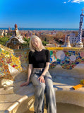 DAXUEN Distressed wide-leg jeans in washed grey denim — model photo