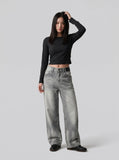 DAXUEN Distressed wide-leg jeans in washed grey denim — model photo