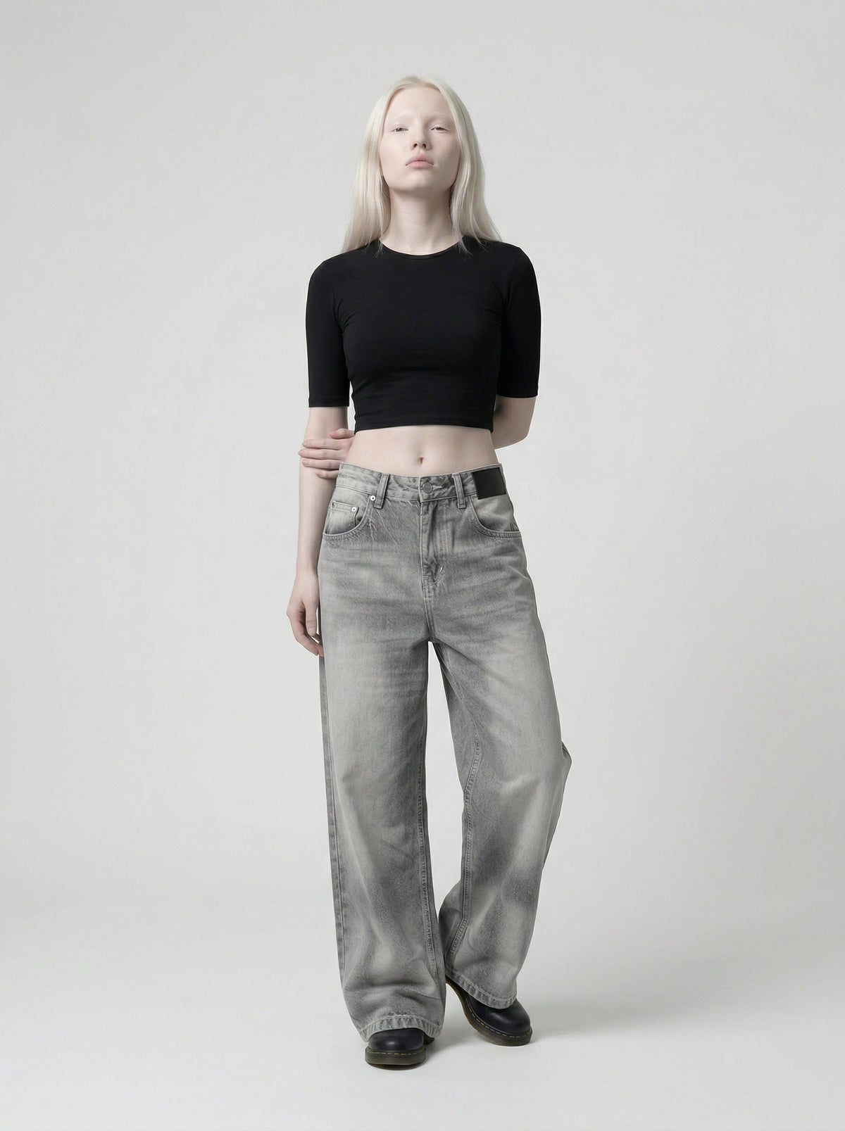 DAXUEN Distressed wide-leg jeans in washed grey denim — model photo