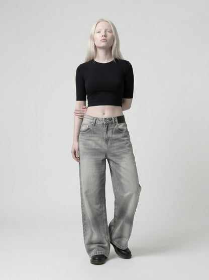 DAXUEN Distressed wide-leg jeans in washed grey denim — model photo