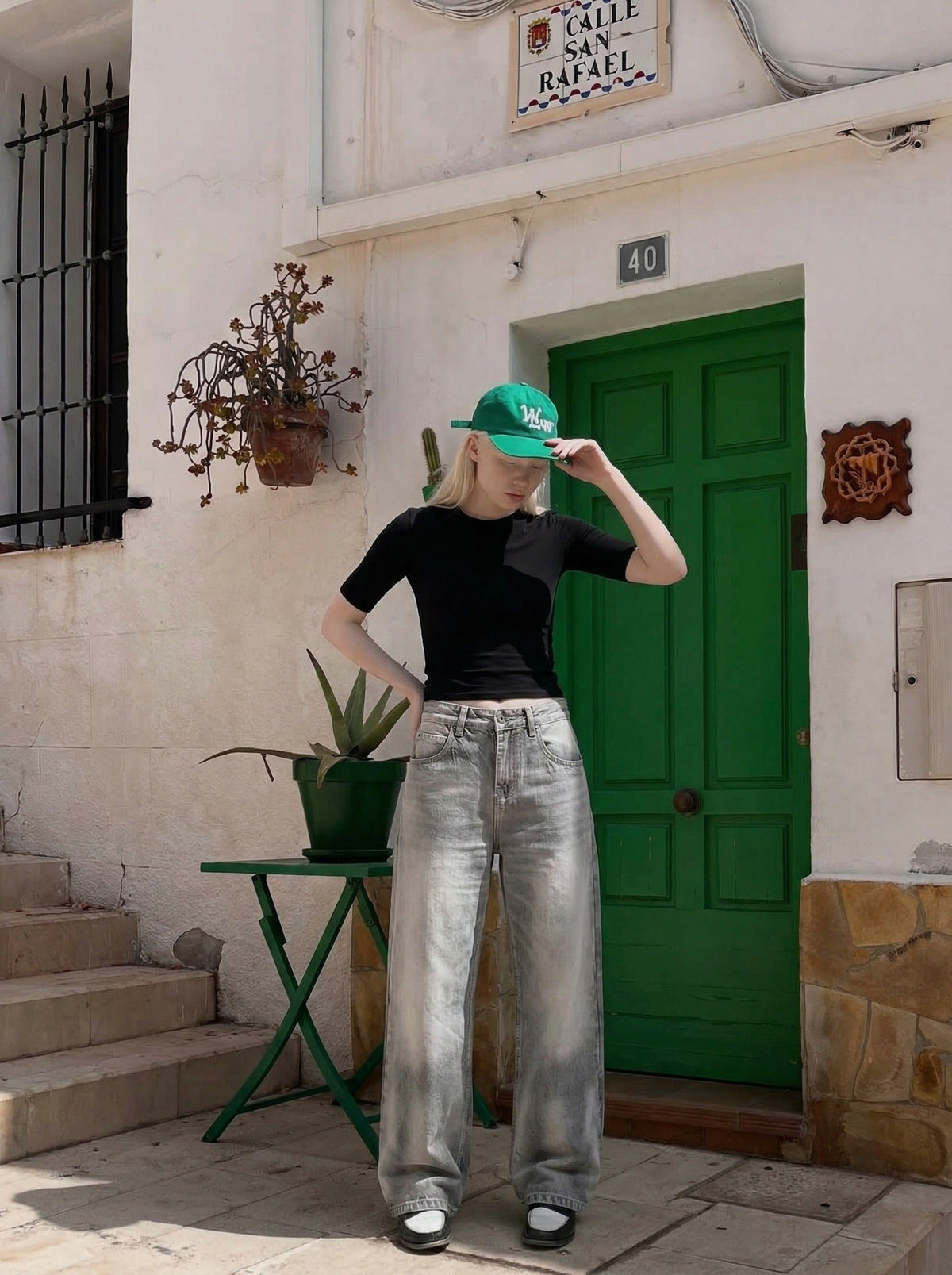 DAXUEN Distressed wide-leg jeans in washed grey denim — model photo