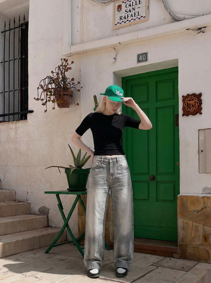 DAXUEN Distressed wide-leg jeans in washed grey denim — model photo