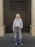 DAXUEN light-to-medium blue distressed wide-leg star print jeans — model photo