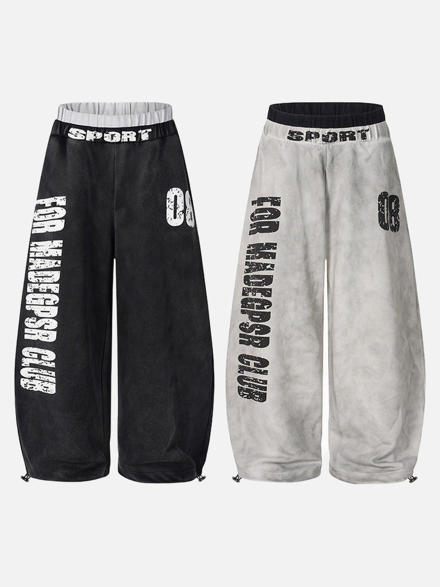 DAXUEN Distressed wide-leg sweatpants in black and grey