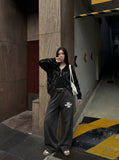 DAXUEN Distressed wide-leg sweatpants with graphic print — model photo