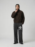 DAXUEN Distressed wide-leg sweatpants with graphic print — model photo