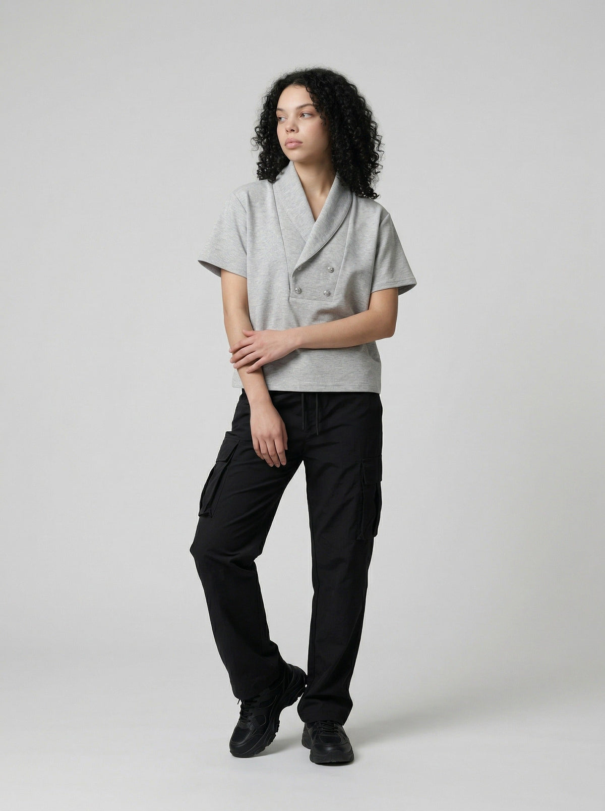 DAXUEN Double-breasted short-sleeved top with shawl collar — model photo
