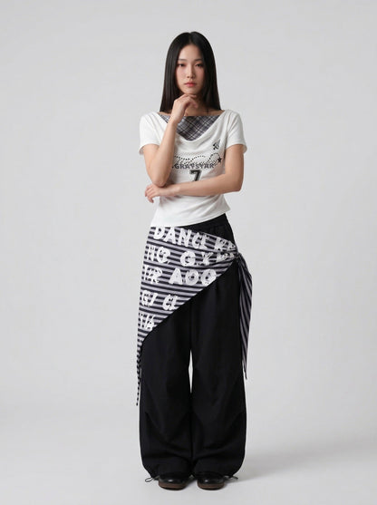 DAXUEN Draped asymmetrical women's t-shirt with graphic design — model photo