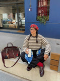 DAXUEN Wide-leg cargo pants with decorative overlays — model photo