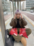 DAXUEN Wide-leg cargo pants with decorative overlays — model photo