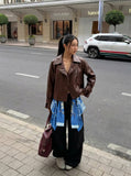 DAXUEN Wide-leg cargo pants with decorative overlays — model photo
