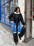DAXUEN Wide-leg cargo pants with decorative overlays — model photo