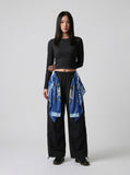 DAXUEN Draped graphic cargo pants with unique prints — model photo