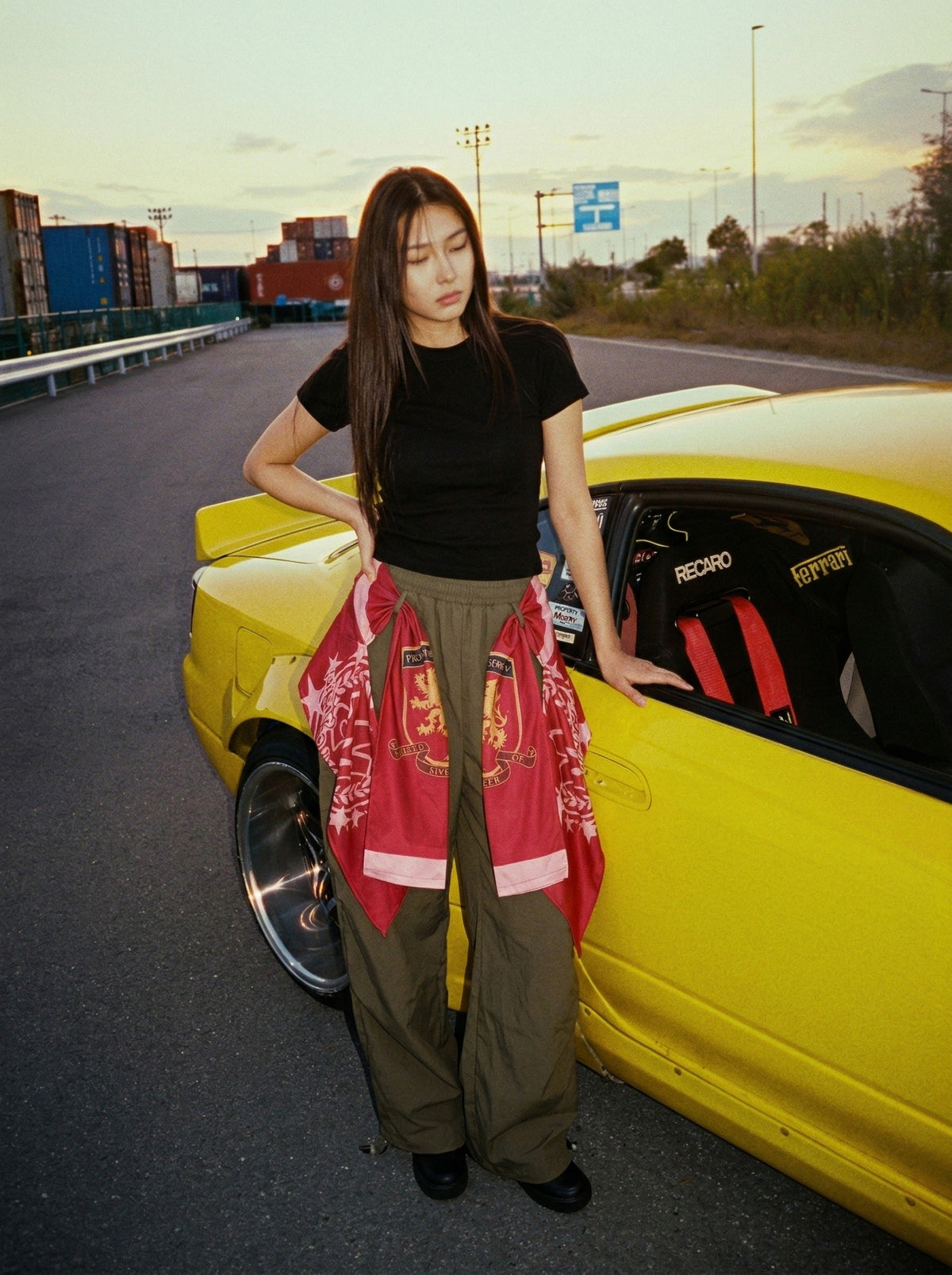 DAXUEN Draped graphic cargo pants with unique prints — model photo