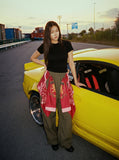 DAXUEN Draped graphic cargo pants with unique prints — model photo