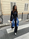 DAXUEN Draped graphic cargo pants with unique prints — model photo