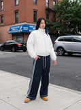 DAXUEN dark navy wide-leg pants with white stripes — model photo