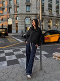 DAXUEN dark navy wide-leg pants with white stripes — model photo