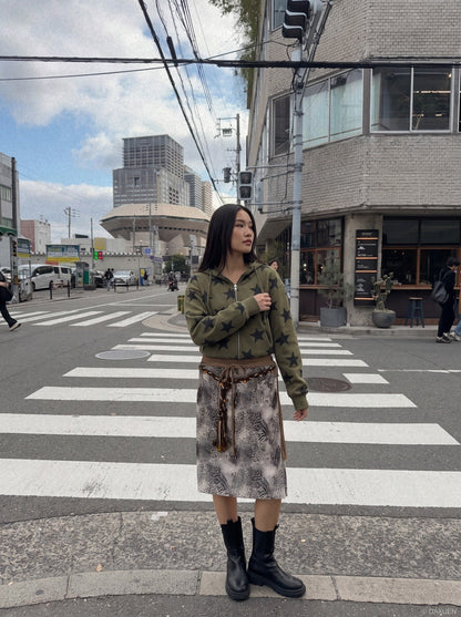 DAXUEN grey black white dynamic animal print wrap skirt — model photo