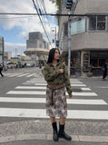 DAXUEN grey black white dynamic animal print wrap skirt — model photo