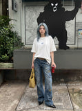 DAXUEN white oversized blue wave graphic t-shirt — model photo