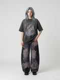 DAXUEN washed black oversized dynamic glitch graphic tee — model photo