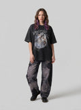 DAXUEN washed black oversized dynamic glitch graphic tee — model photo