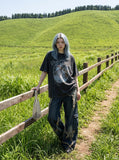 DAXUEN washed black oversized dynamic glitch graphic tee — model photo