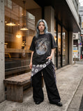 DAXUEN washed black oversized dynamic glitch graphic tee — model photo