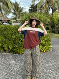 DAXUEN cream reddish-brown dynamic MR graphic color-blocked tee — model photo