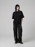 DAXUEN Oversized short-sleeve embroidered T-shirt in black and white — model photo