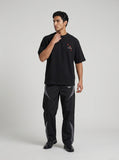 DAXUEN Oversized short-sleeve embroidered T-shirt in black and white — model photo