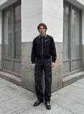 DAXUEN Men's relaxed-fit black bomber jacket — model photo