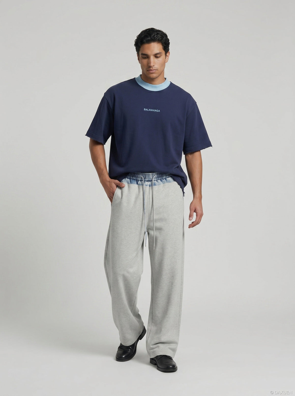 DAXUEN Relaxed-fit crew-neck t-shirt with bold text — model photo