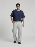 DAXUEN Relaxed-fit crew-neck t-shirt with bold text — model photo