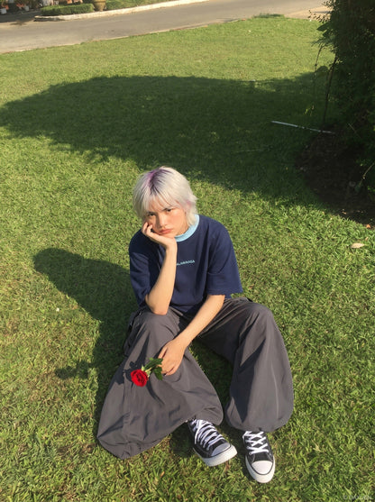 DAXUEN Relaxed-fit crew-neck t-shirt with bold text — model photo