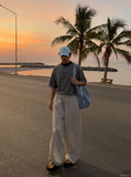 DAXUEN Relaxed-fit crew-neck t-shirt with bold text — model photo