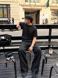 DAXUEN Edgy Metal Eyelet Black T-Shirt | DAXUEN — model photo