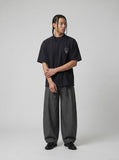 DAXUEN Oversized short-sleeve graphic t-shirt with raw edges — model photo
