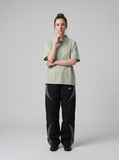 DAXUEN Short-sleeved polo shirt with unique emblem — model photo