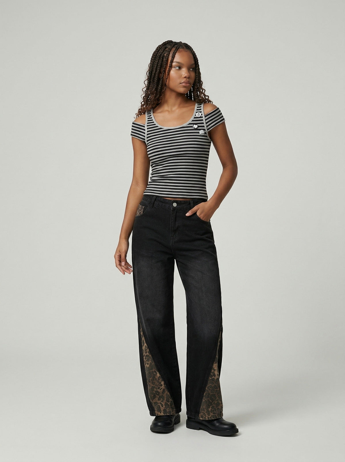 DAXUEN Fitted women's striped tank top with cut-out shoulders — model photo