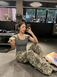 DAXUEN Fitted women's striped tank top with cut-out shoulders — model photo
