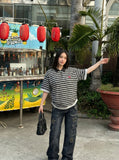 DAXUEN Oversized striped polo shirt with embroidery — model photo