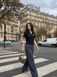 DAXUEN Short-sleeve polo shirt with striped details and embroidery — model photo
